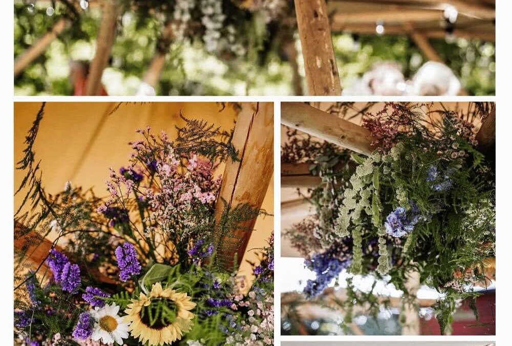 Blomsterdekoration til barnedåb i tipi